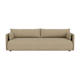 A front-on view of the Offset Sofa, a three-seater upholstered in Audo Bouclé 02, a light beige textured fabric.