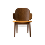 Penguin Wooden Lounge Chair in red-stained oak with a tan Aida 0250 upholstered seat and curved backrest.