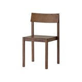 Dark-stained oak Mauro Dining Chair with a matching veneer seat and curved backrest, viewed from a slight angle.