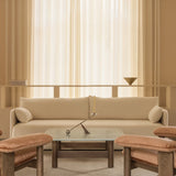 Beige living room with Offset Sofa, Lounge Table, Interconnect Candle Holder, and Brasilia Lounge Chairs.