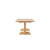 Puffin Dining Table, Rectangular in solid natural oak, showing the side profile and rounded base on a white background.