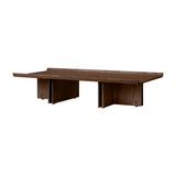 Conrad Lounge Table in dark-stained oak veneer, shown from an angle highlighting its raised edges and architectural base.