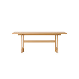 Rectangular Puffin Dining Table in solid natural oak, featuring a minimalist Shaker-inspired wooden frame.