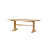 Rectangular Puffin Dining Table in natural oak, featuring a solid oak base and clean, Shaker-inspired design details.