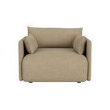 Front view of the Offset Sofa, a 1-seater armchair upholstered in light beige Audo Bouclé 02 fabric on black background